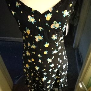 New,with original tags black floral mini dress with granulated ruffle hem size s